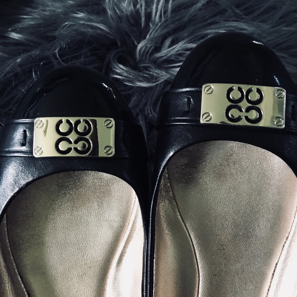 Lady’s flat cute leather Coach shoe